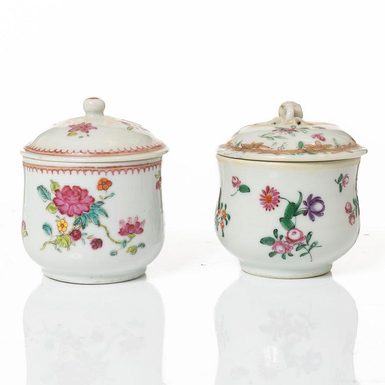 A group of 12 CHinese famille rose porcelain custard cups with covers, Qing dynasty, 18th century.