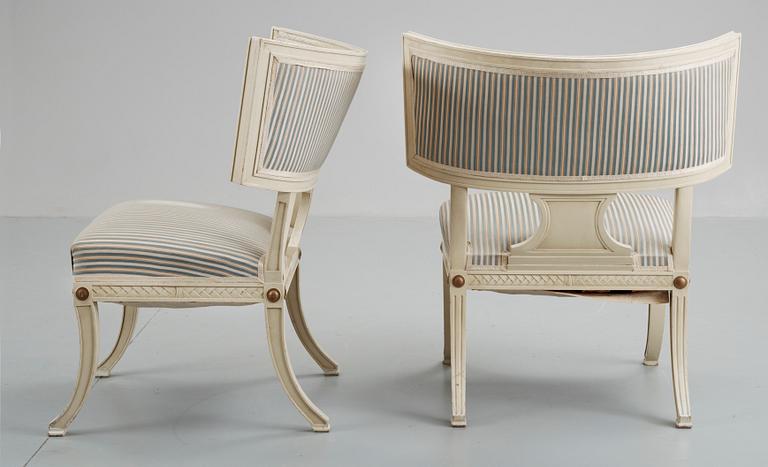 A pair of Gustavian style 20th cent chairs.