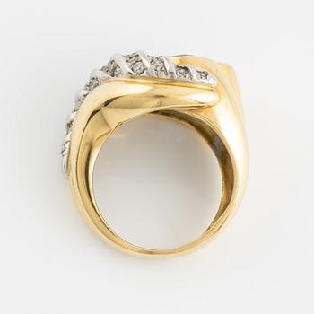 18K gold and heart shaped blue topaz and white stones.