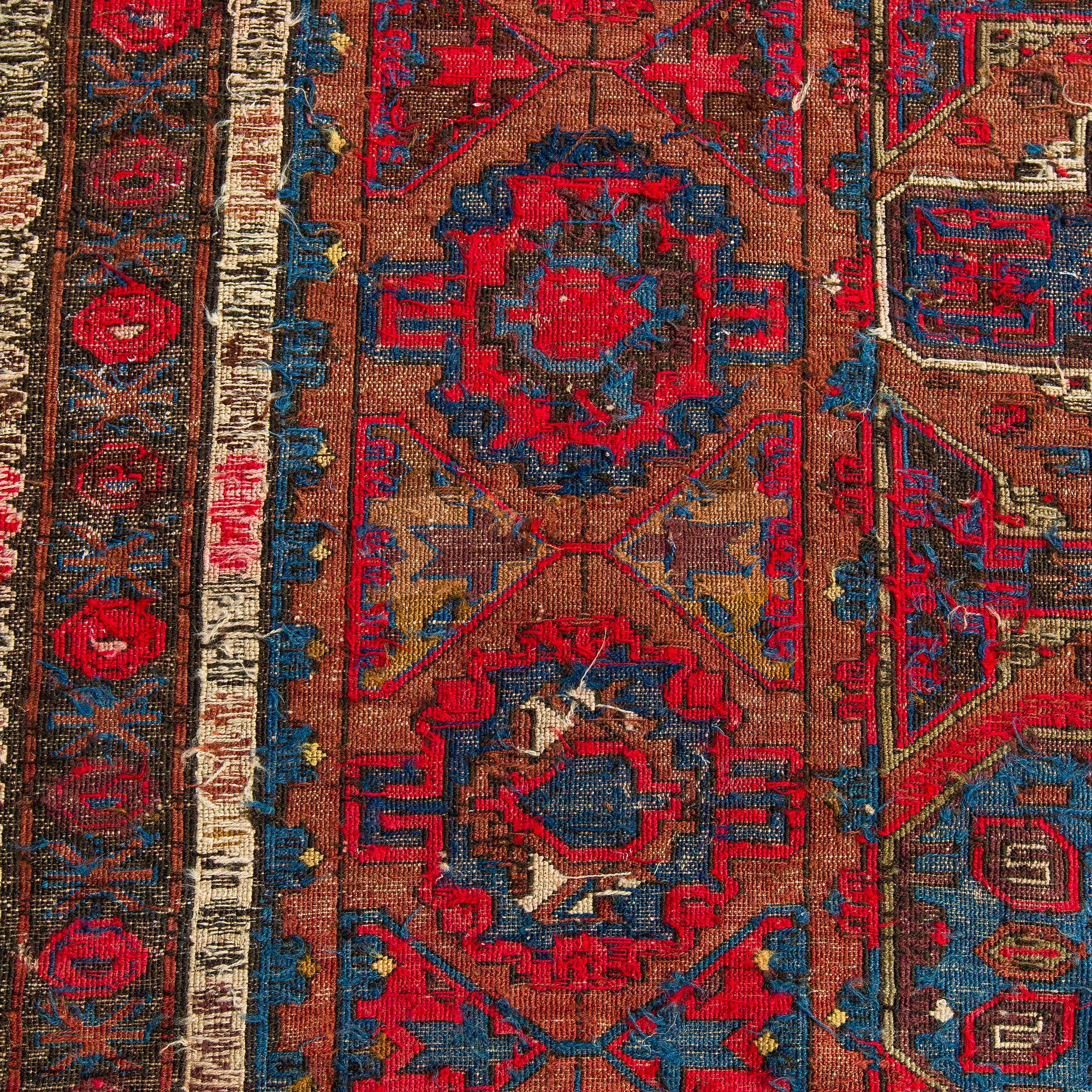 An Antique East Caucasian Soumak carpet ca. 348 x 211 cm.