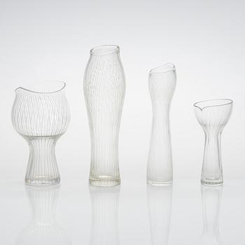 Tapio Wirkkala, four line-cut clear glass vases, signed Tapio Wirkkala Iittala.