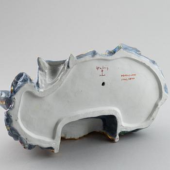 A porcelain figurine of a seated Rococo lady, 20th century, Italy.