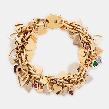 485. An 18K gold Gaudy bracelet with heart shaped charms.