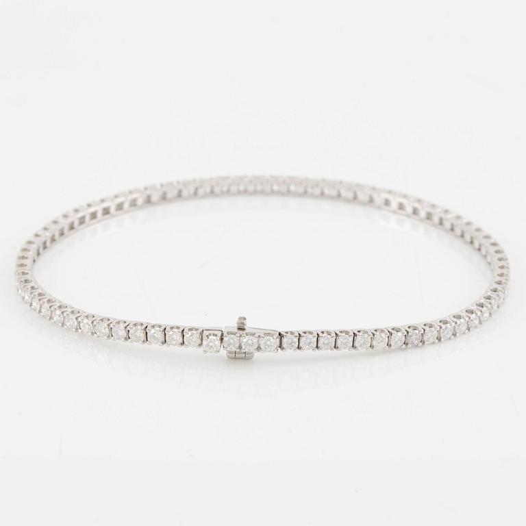 Tennis bracelet, 18K white gold with brilliant-cut diamonds.