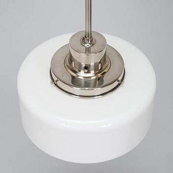 Paavo Tynell, kattovalaisin, malli 2004, Taito 1930-luku.