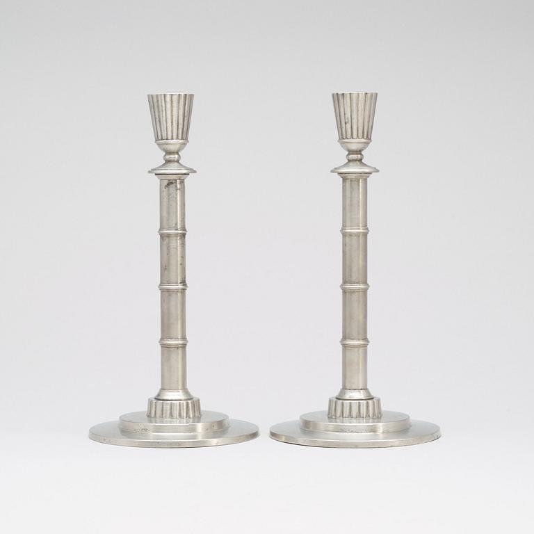 A pair of Erik Fleming pewter candlesticks by Norrahammars Bruk, Sweden 1931.