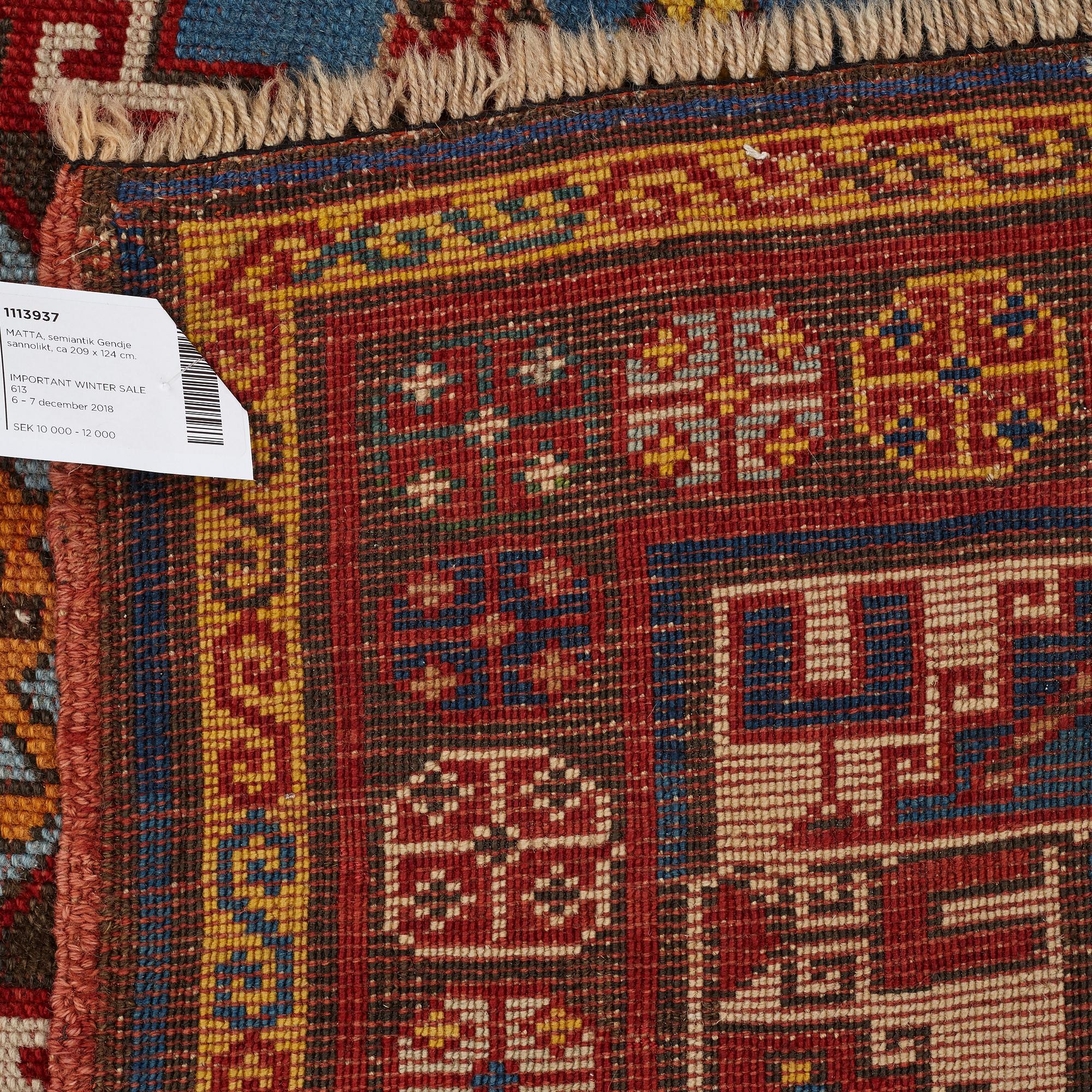 A RUG, a semi-antique Gendje probably, ca 209 x 124 cm.