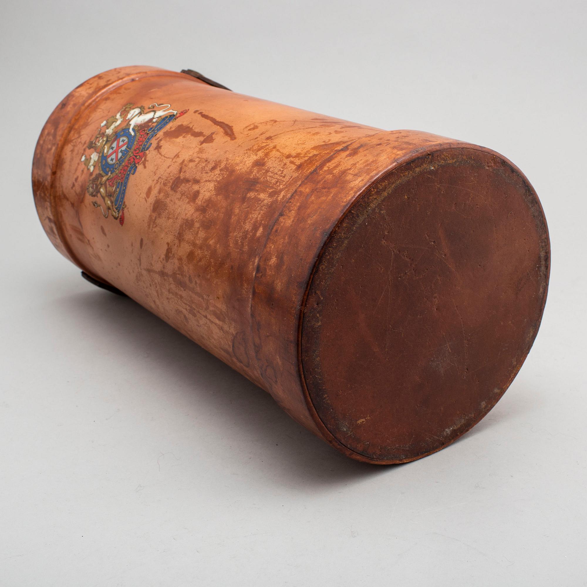 A LEATHER UMBRELLA STAND.