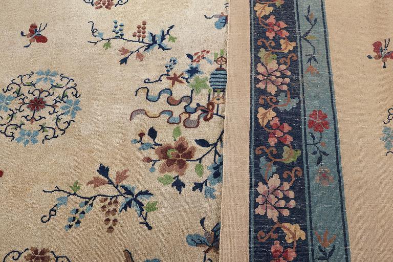 A semi-antique carpet, China, c. 350 x 275 cm.