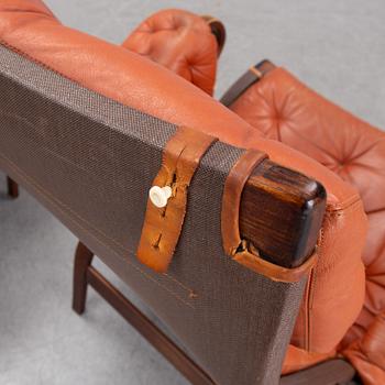 An end of the 20th Century pair of 'Pernilla' easy chairs with leather upholstery by Bruno Mathsson for DUX.