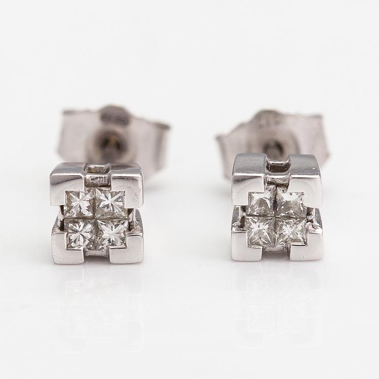 Korvakorupari, 14K valkokultaa sekä prinsesshiottuja timantteja yht n 0.08ct.