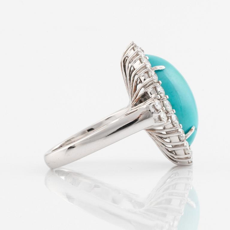 A turquoise and round brilliant cut diamond ring.