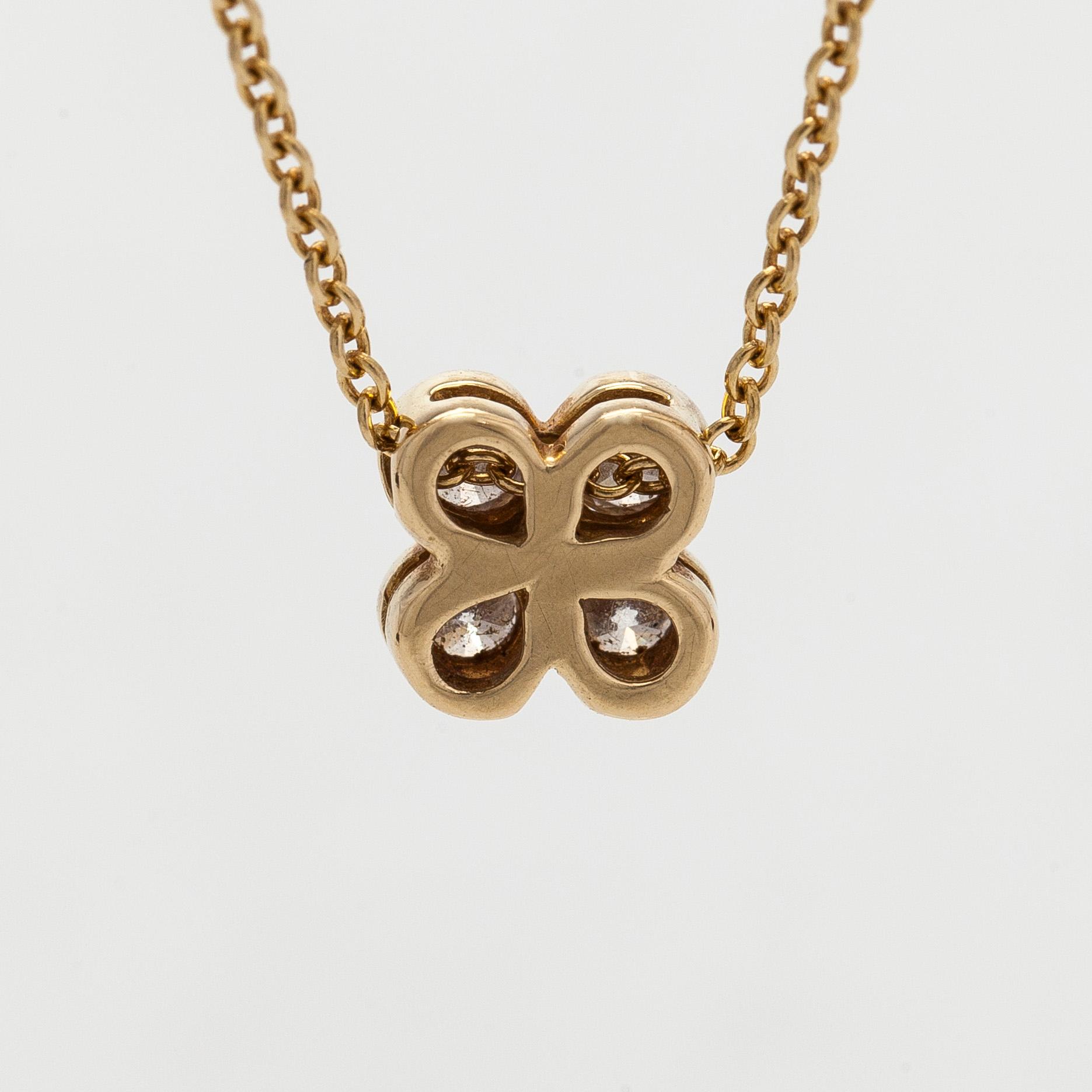 Tiffany & Co, an 18K gold necklace with diamonds.