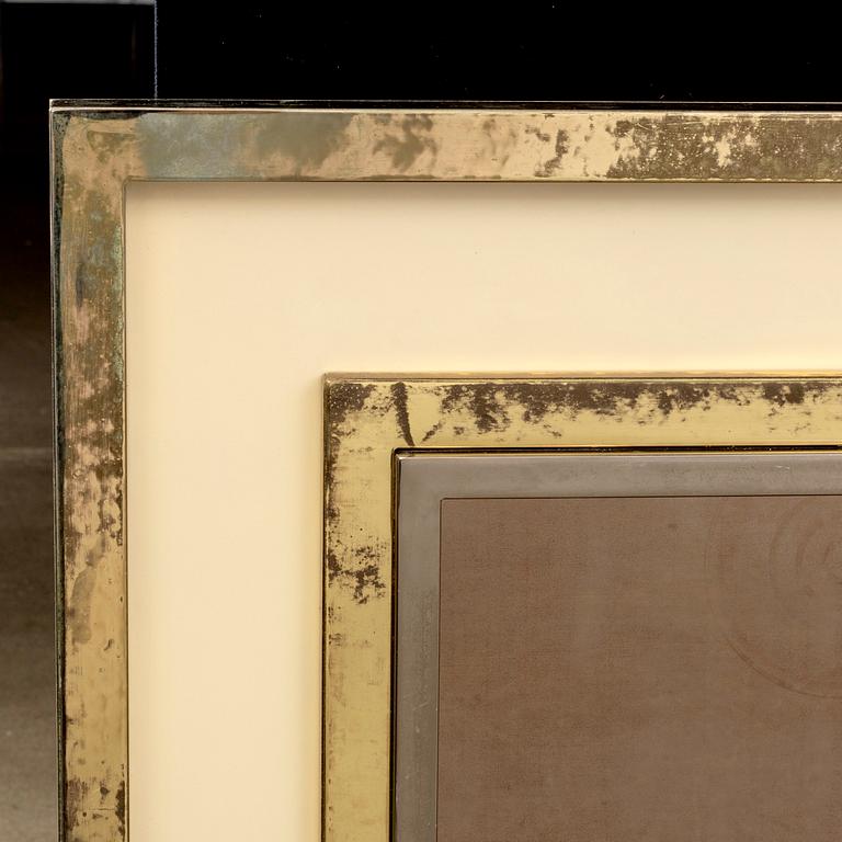 A 1970'S WALL MIRROR.