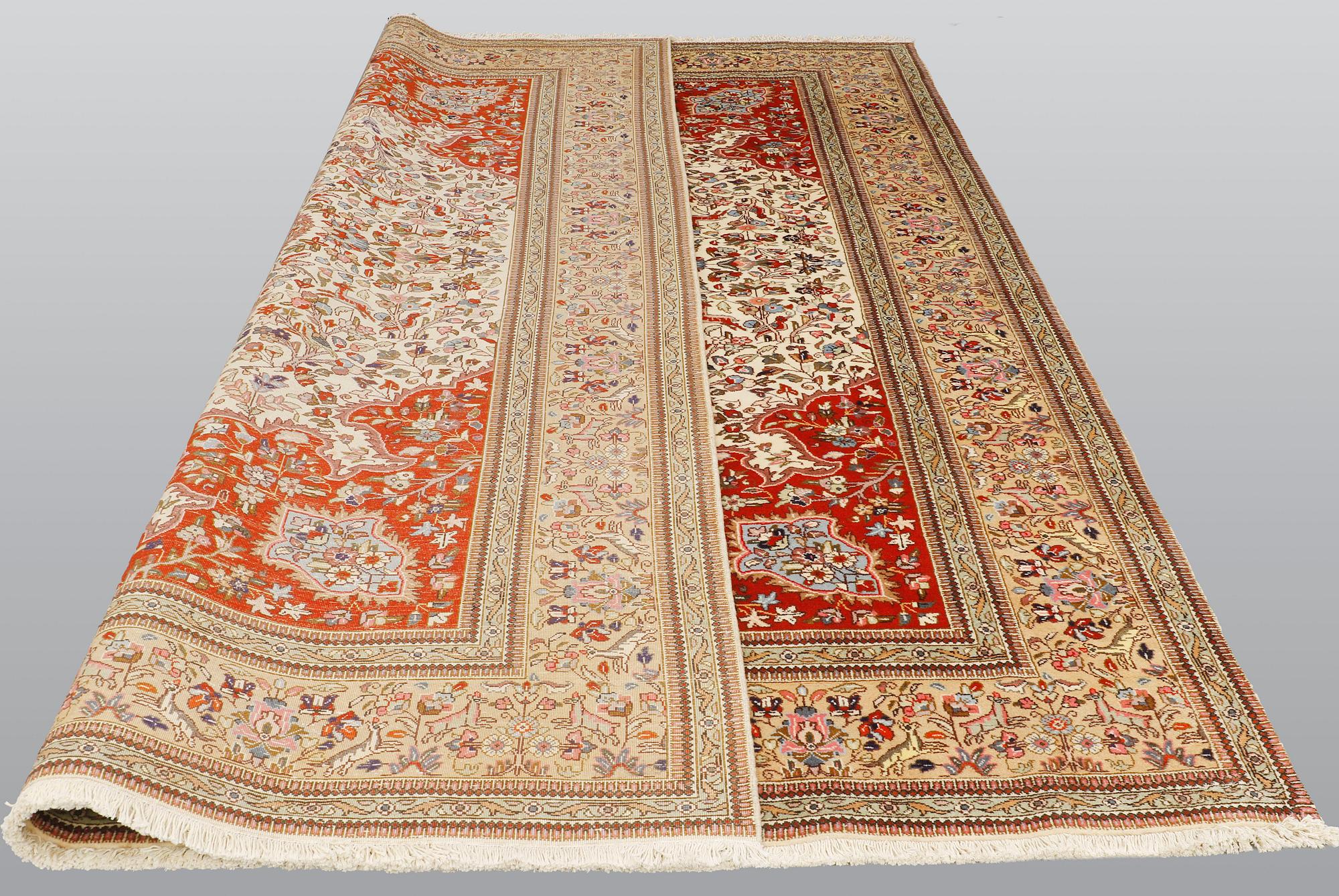 A carpet, Figural Tabriz, so called,  Tabatabai, 380 x 282 cm.