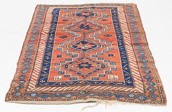 An Oreintal carpet, circa 251 x 135 cm.