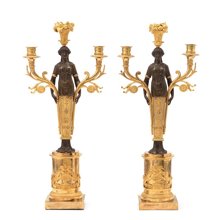 A pair of Swedish Empire early 19th century three-light candelabra.