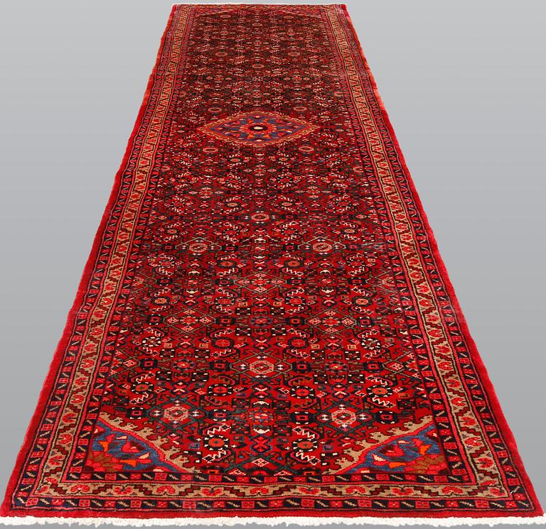 A Hosseinabad runner, ca 427 x 110 cm.
