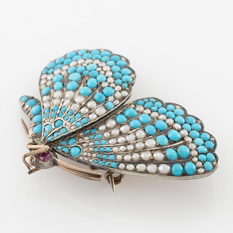 Brooch/pendant and earrings, in the form of butterflies, silver with turquoises and pearls.