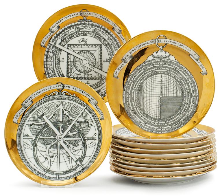 A set of twelve Piero Fornasetti 'Astro labio' porcelain plates, Milan, Italy.