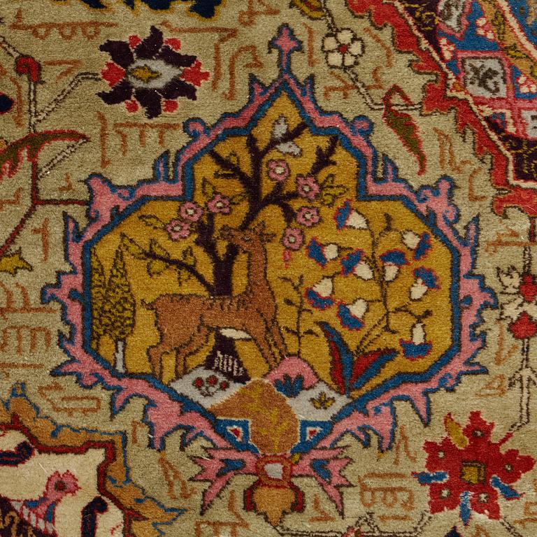 A CARPET, a semi-antique Tabriz, ca 342 x 269 cm.