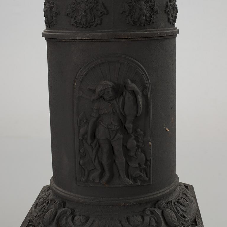 AN EARLY 20th CENTURY CAST IRON STOVE.