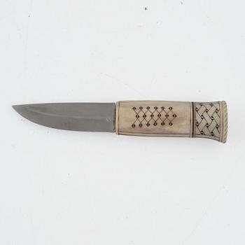 Sven-Åke Risfjell, a reindeer horn knife, signed and dated -86.