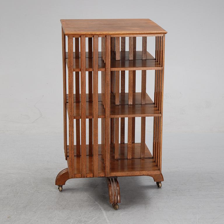 An oak revolving book case, early 20th Century.