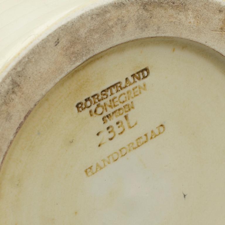 GERTRUD LÖNEGREN, a stoneware vase and two plates, Rörstrand.