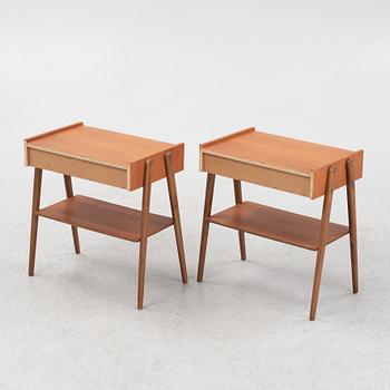 A pair of teak veneered bedside tables, 1950's/60's.