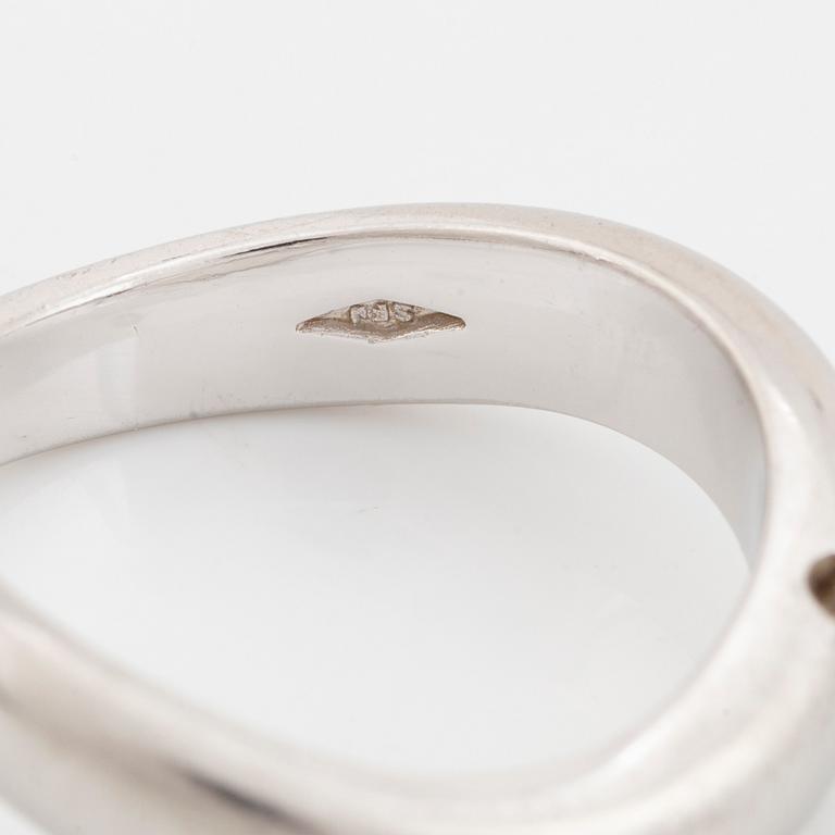 Platinum and brilliant cut diamond ring.