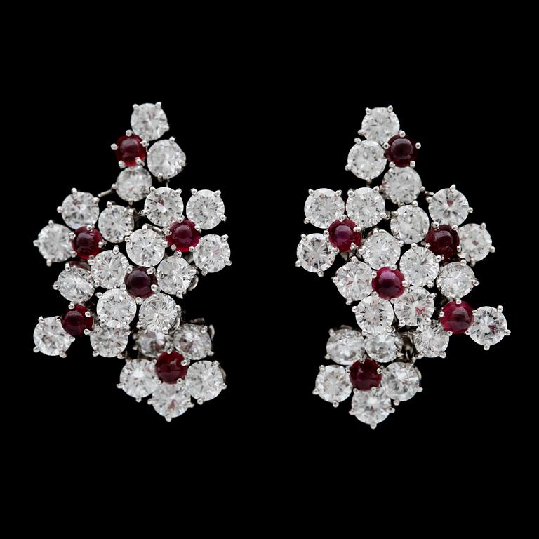 A pair of Petochi ruby and brilliant cut diamond earrings, tot. app. 8 cts.