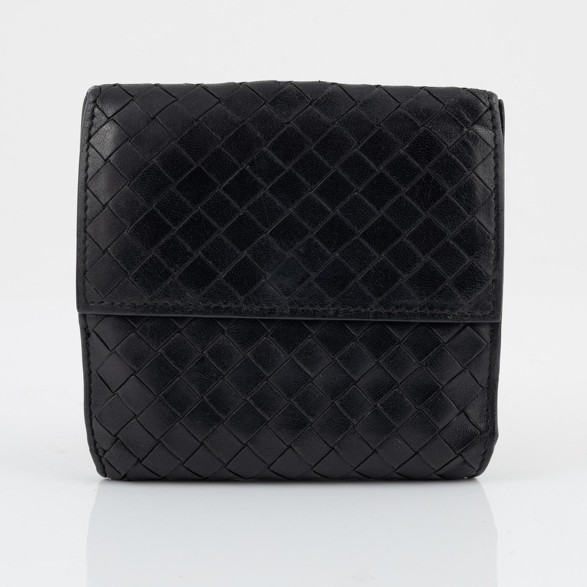 Bottega Veneta, a wallet and bracelet.