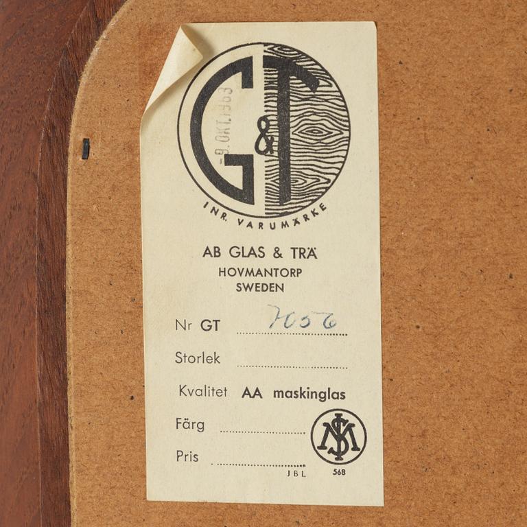 A mirror, Glas & Trä, Hovmantorp, dated 1963.