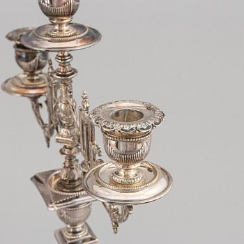A pair of silver plated candelabras, early 20th century.