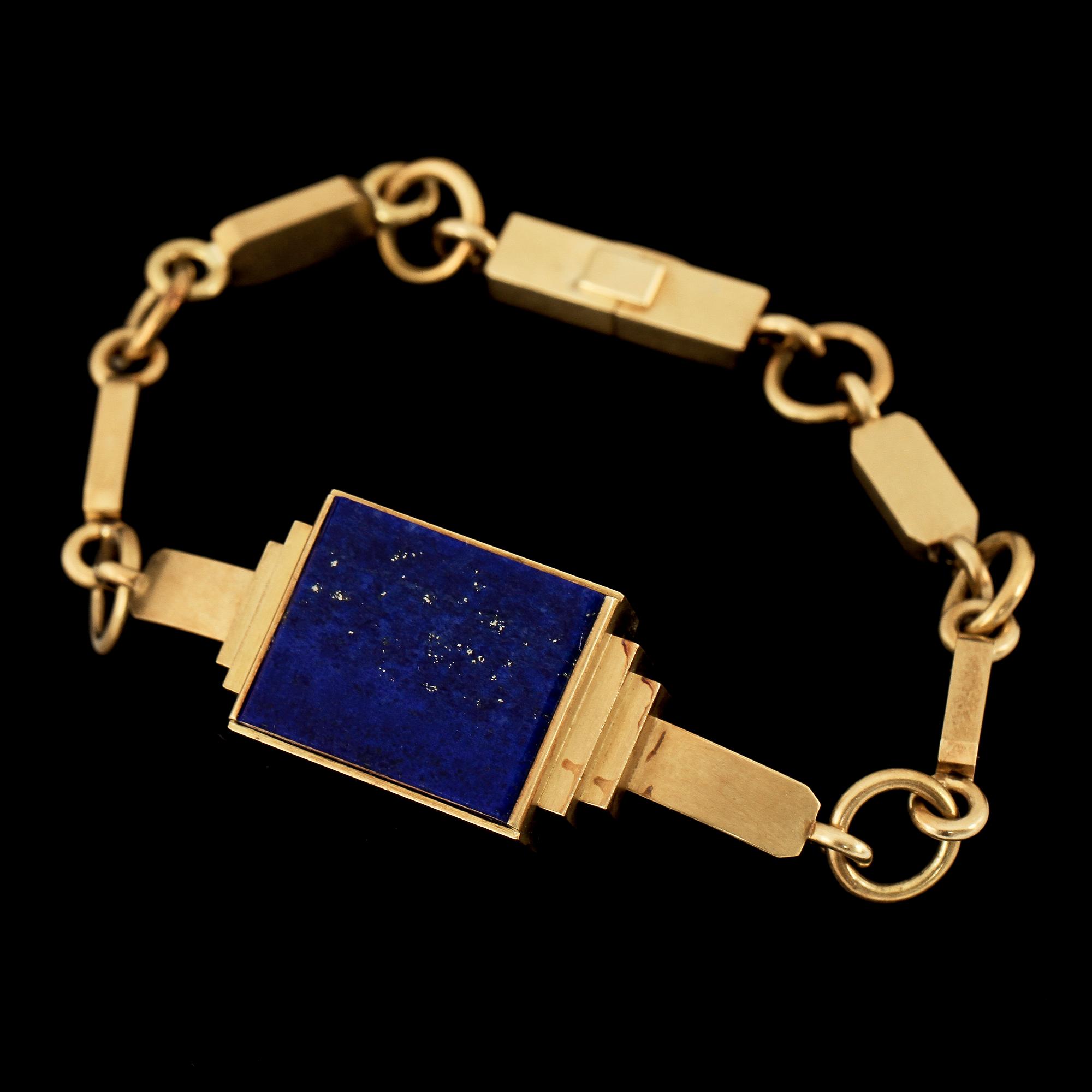 GARNITYR, 4 delar, 18k guld med lapis lazuli, Wiven Nilsson, Lund 1940 - 59. Tot vikt 69 g.