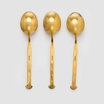 A set of 15 spoons, gilt sterling silver and enamel, Aksel Holmsen, Norway.