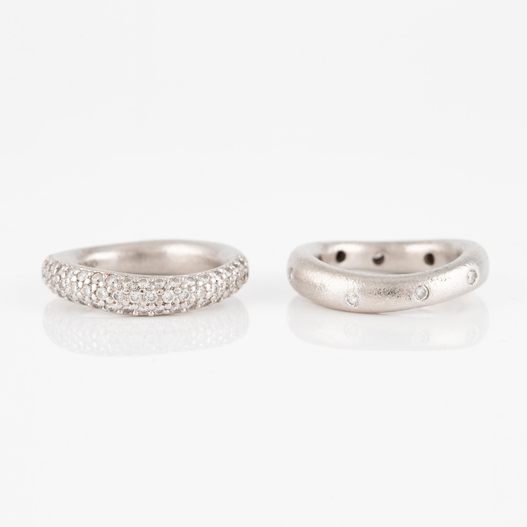 Ole Lynggaard two "Love" rings no. 4 in 18K white gold with round brilliant-cut diamonds.