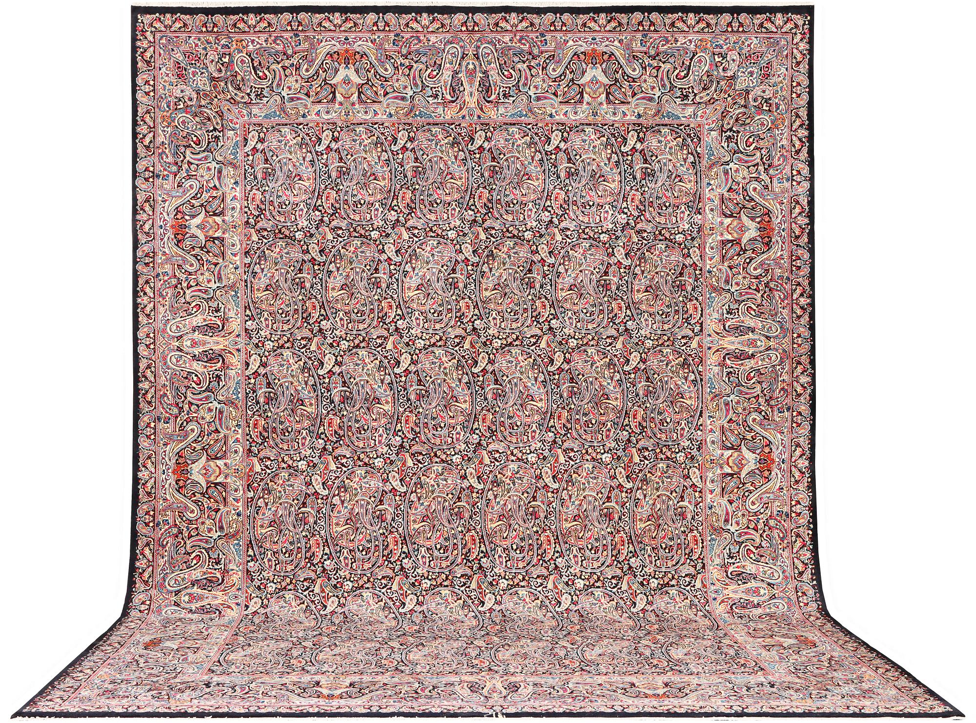 A Kirman carpet, c. 475 x 342 cm.