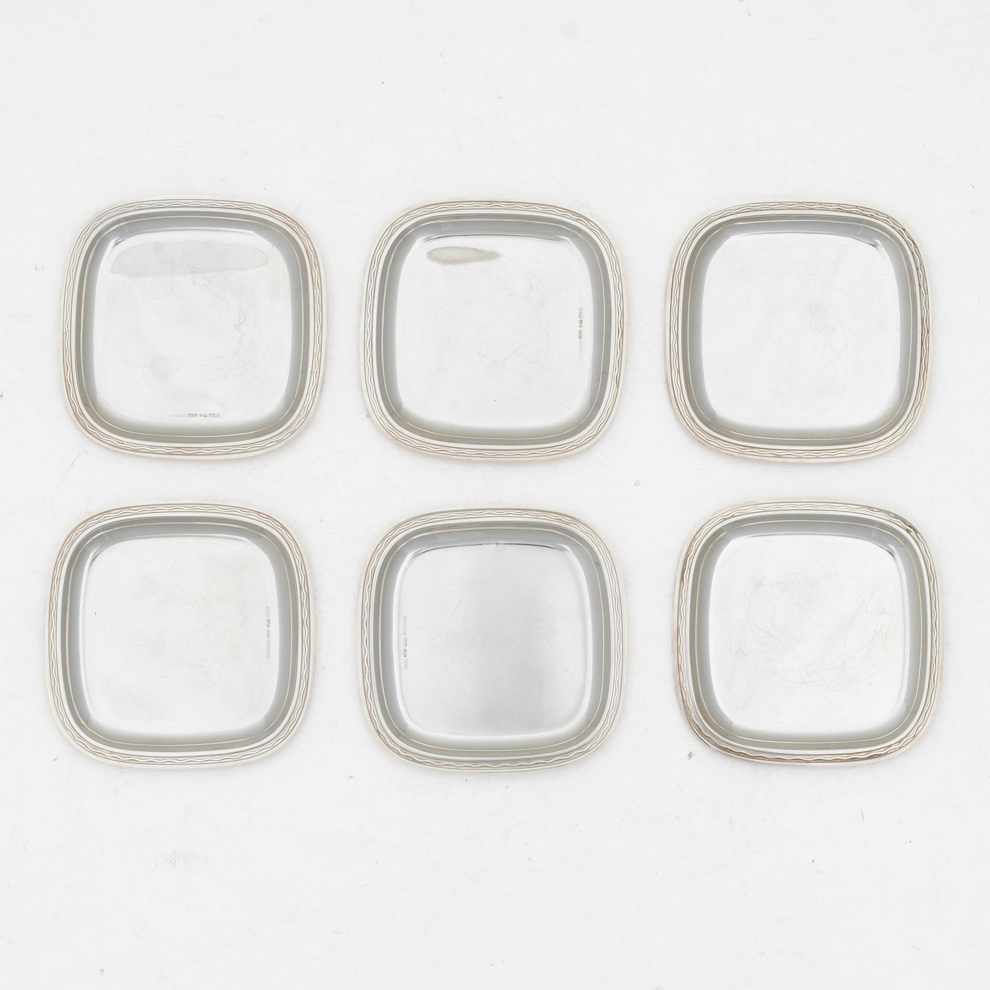 C.G. Hallberg, Coasters / ashtrays, 6 pcs, sterling silver, design by Gustaf Janson, Stockholm 1955-57.