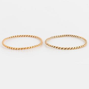 Two 14K gold bangles.