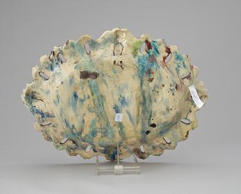 A majolica charger in the style of Pallisy, 'Istoriato'.