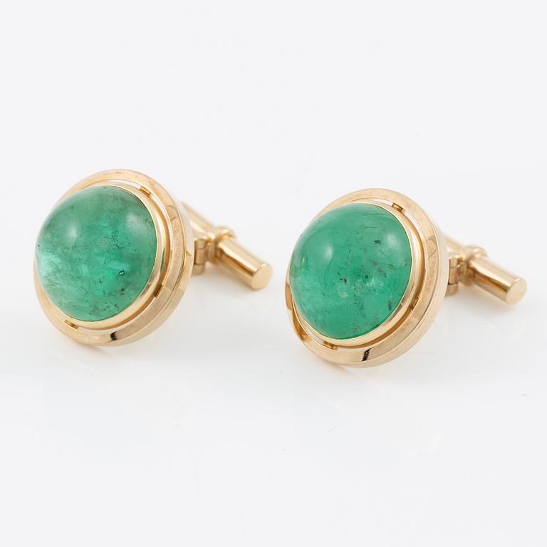 Cufflinks, a pair, 14K gold with cabochon-cut emeralds.