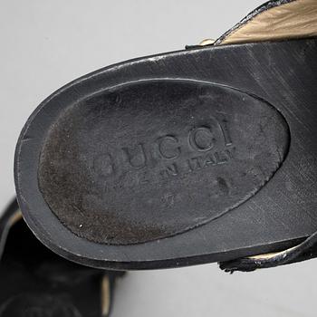 SKOR, ett par slip in, Gucci.