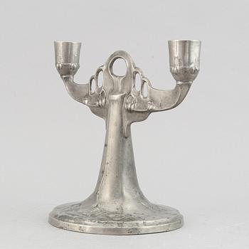 A Kayserzinn pewter vase and candelabrum, German, early 20th Century.