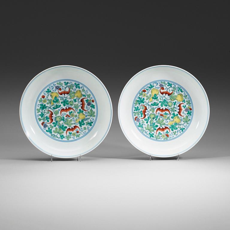 A pair of doucai dishes, Republic (1912-49) with Yongzhengs six character mark within double circles.