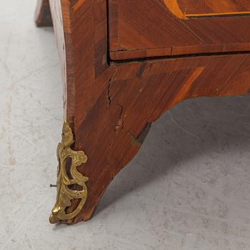 A French Louis XV marquetry and gilt-bronze mounted commode 'Aux bustes de femmes", later part of the 18th century.