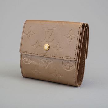 A beige monogram vernis wallet by Louis Vuitton.