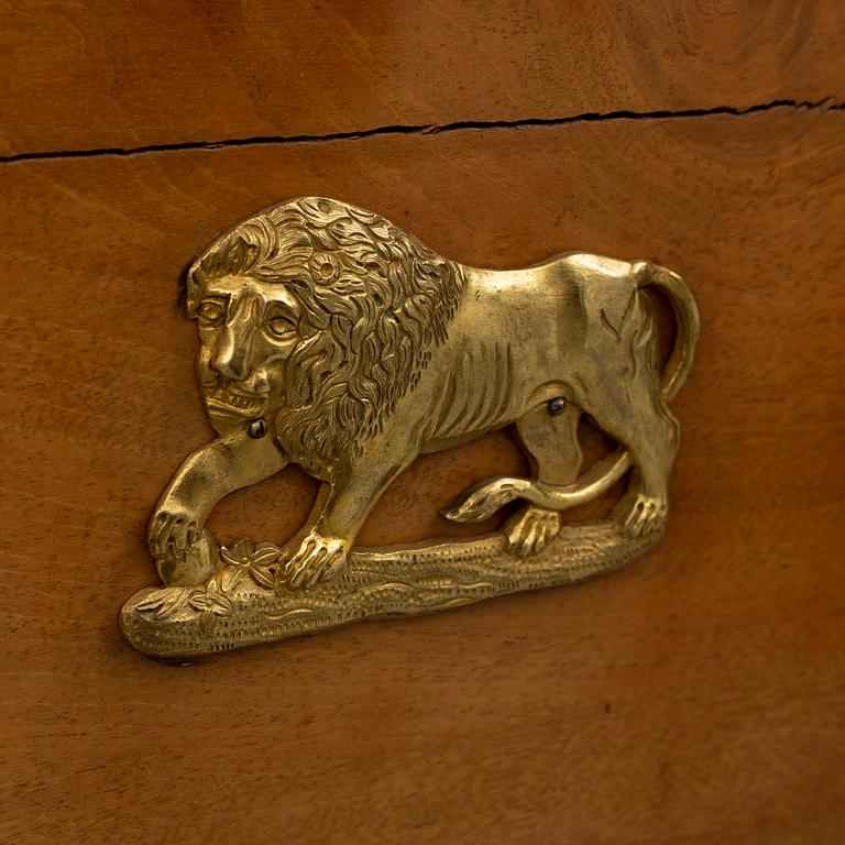 A northern european empire chiffonier, first half of the 19th century.