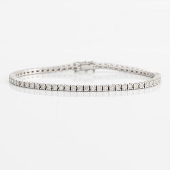 Tennis bracelet, 18K white gold with brilliant-cut diamonds.